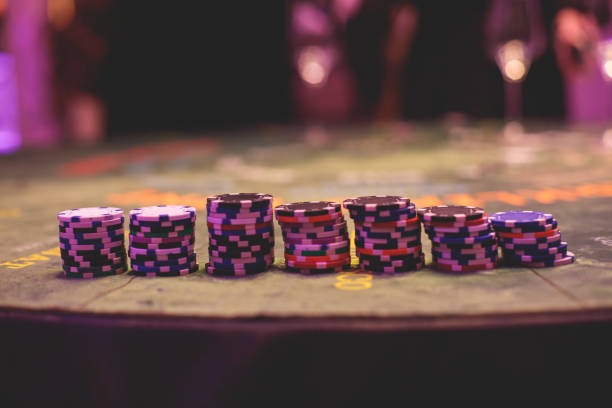 Dream Gaming live dealer blackjack table with cards and chips
